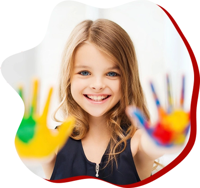 A girl with hands painted in different colors.